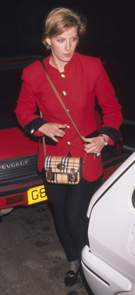 Duchess Sophie wearing a red military jacket and black trousers