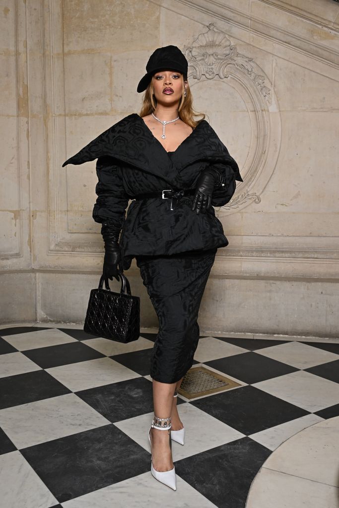 Rhianna wears an all black out fit to Dior's Haute Couture Spring/Summer 2024 show in paris