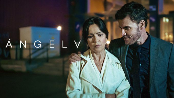 man with arm round woman