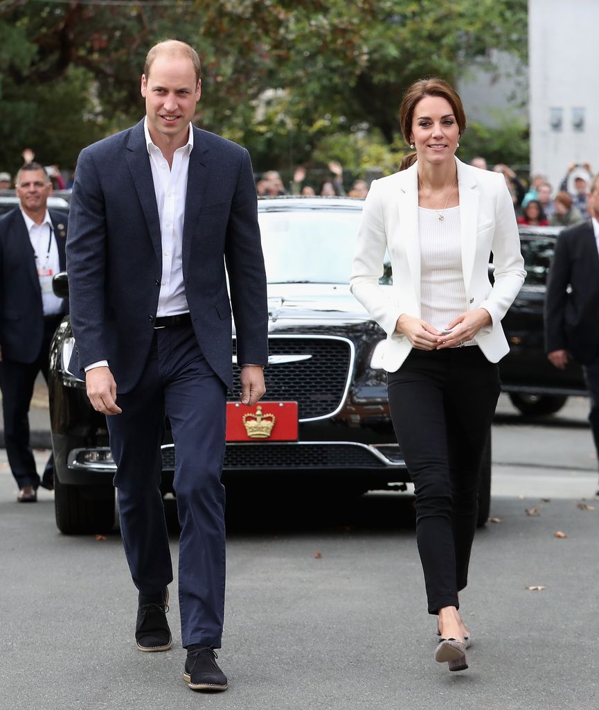 Princess Kate wears a white off-the-shoulder H&M top with a matching blazer in Canada with Prince William