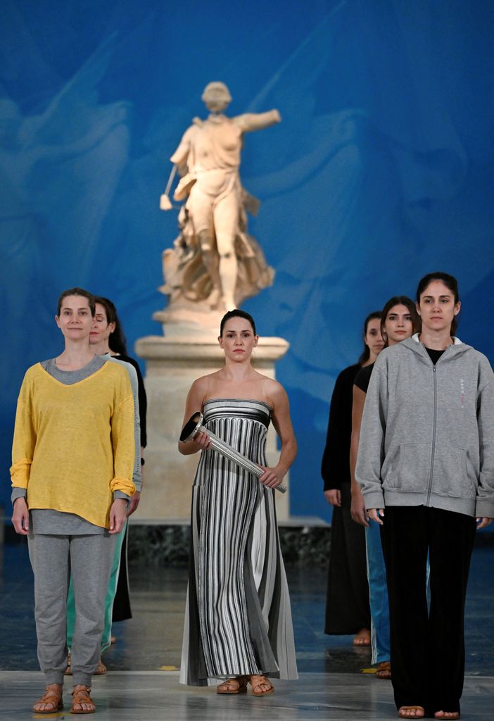 Greek actress Mary Mina on the role of High Priestess takes part in the flame lighting ceremony during a rehearsal of the lighting of the Olympic flame, for the Olympic Winter Games Milano Cortina 2026