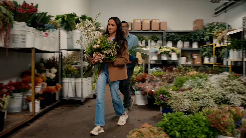 Meghan wears her New Balance 327s to a flower market in episode five