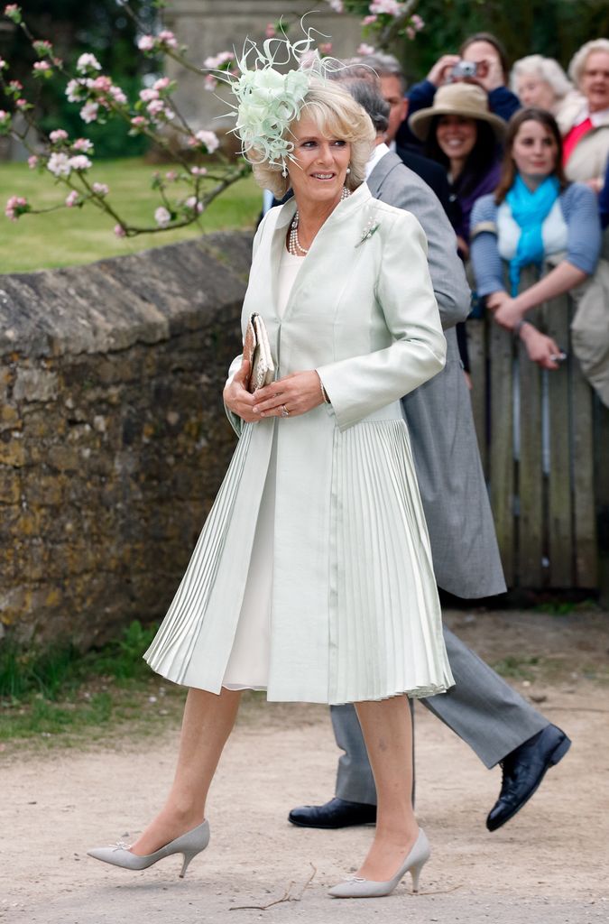 Queen Camilla in a green dress at her daughter Laura Parker Bowles' wedding