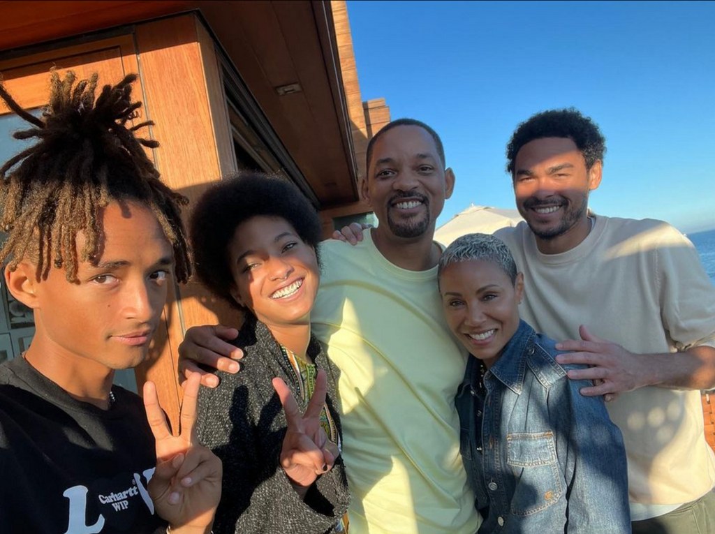 Photo shared by Jada Pinkett-Smith on Instagram August 2023 posing by the beach with her husband Will Smith, stepson Trey Smith, and kids Jaden and Willow Smith