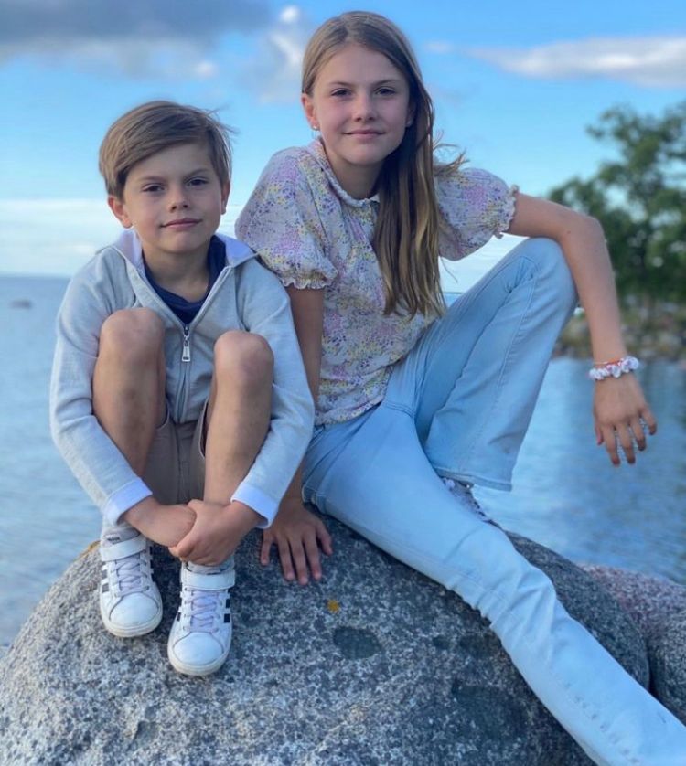 Prince Oscar and Princess Estelle posing by the coast on summer break