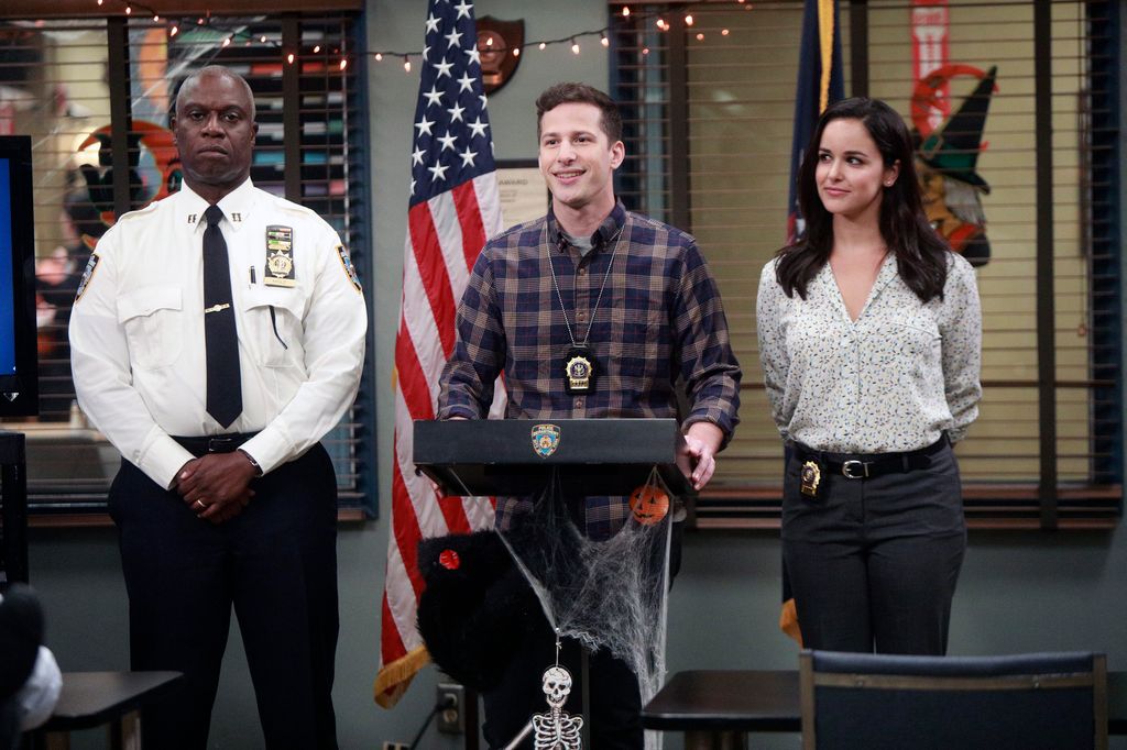 BROOKLYN NINE-NINE -- "HalloVeen" Episode 504 -- Pictured: (l-r) Andre Braugher as Ray Holt, Andy Samberg as Jake Peralta, Melissa Fumero as Amy Santiago -- (Photo by: Jordin Althaus/Fox/Universal Television/NBCU Photo Bank/NBCUniversal via Getty Images)