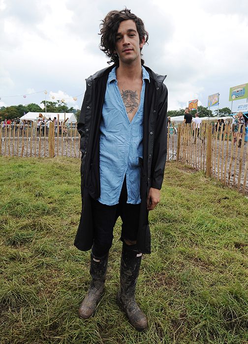 matty healy poses at a festival in the UK