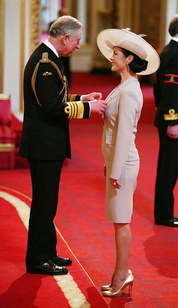 Catherine Zeta-Jones and Prince Charles inside Buckingham Palace