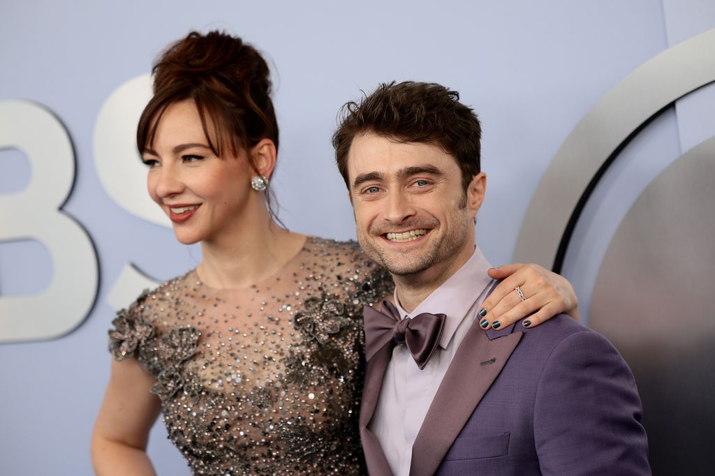 Erin Darke and Daniel Radcliffe attend the The 77th Annual Tony Awards at David H. Koch Theater at Lincoln Center on June 16, 2024 in New York City.