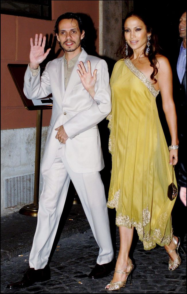 Jennifer Lopez in a yellow dress with her ex Marc Anthony in a white suit