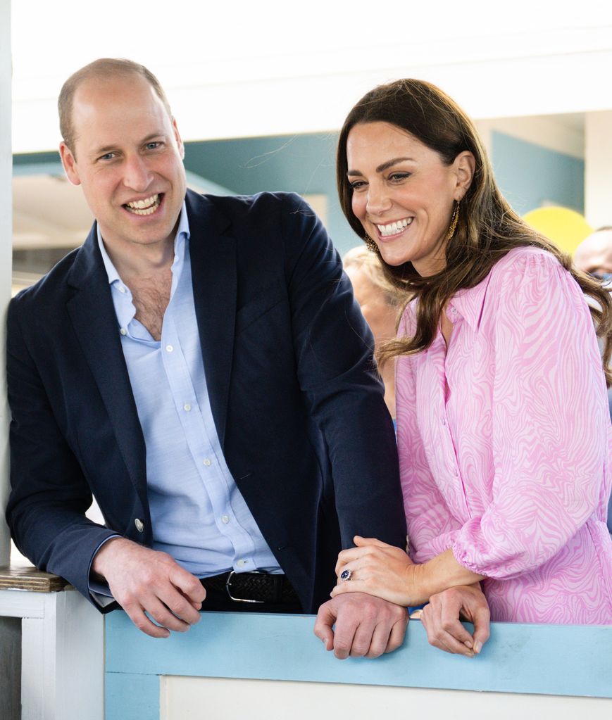 Kate and william laughing holding hands