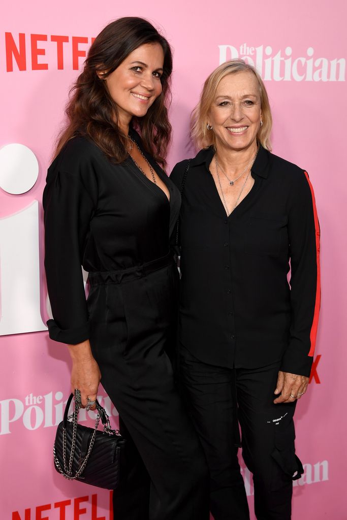 Julia Lemigova and Martina Navratilova in black outfits