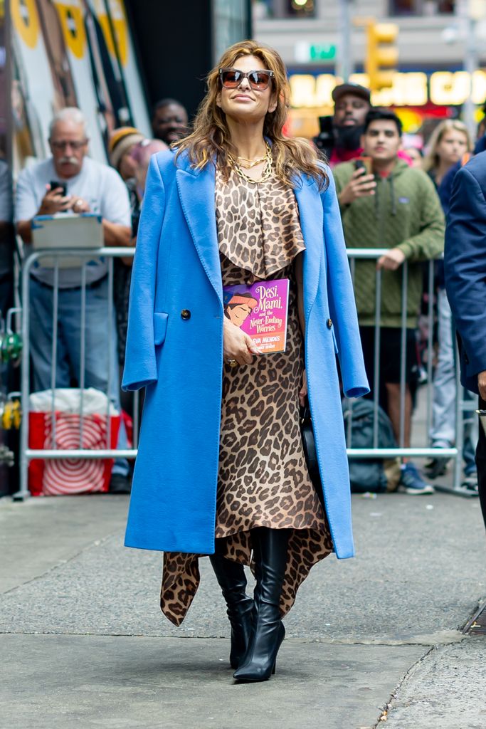 Eva Mendes in leopard print dress and blue coat