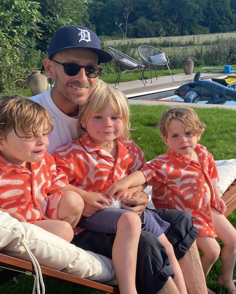 three boys in matching shirts on holiday 