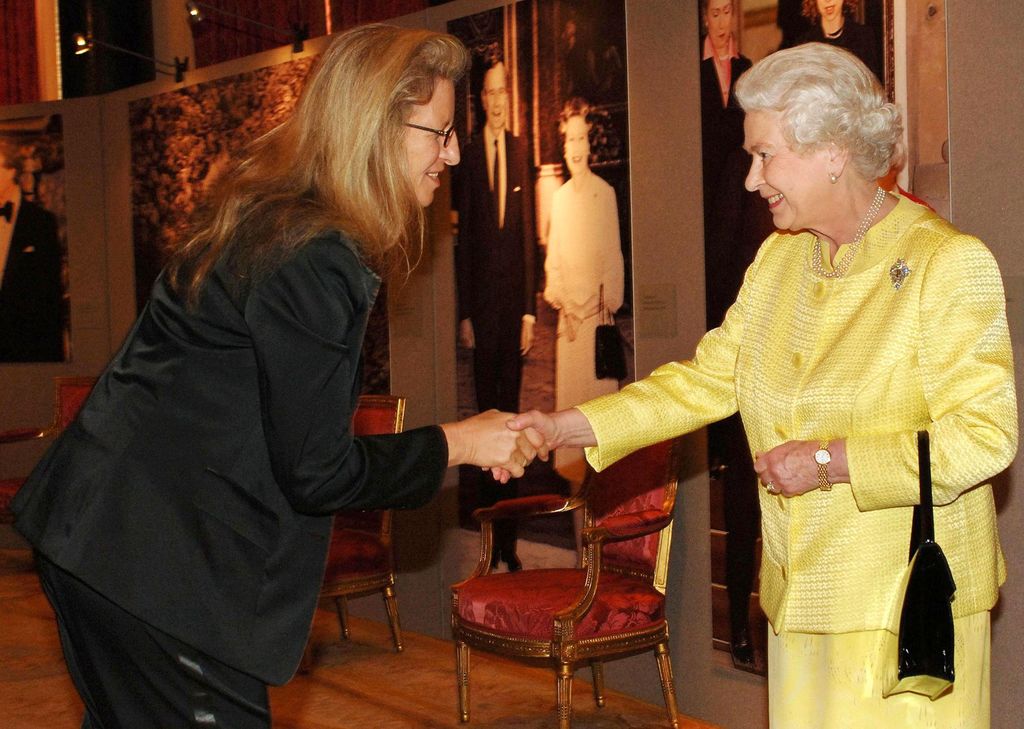 Queen Elizabeth II greeting Annie Leibovitz at a reception for Americans based in England at Buckingham Palace on March 27, 2007