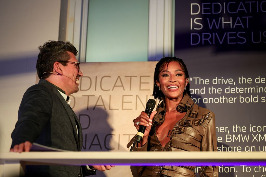 Stefan Ponikva, Vice President of BMW Brand Communication with Naomi Campbell 
