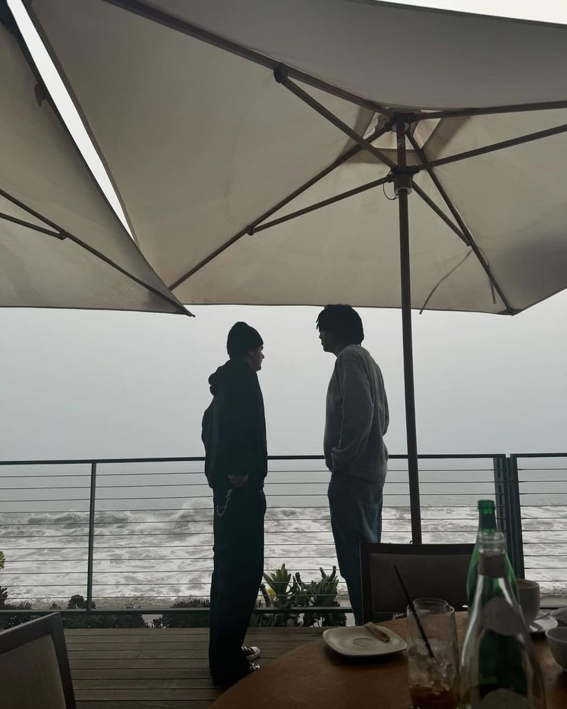 Photo of Aris with Henry Samuel overlooking sea