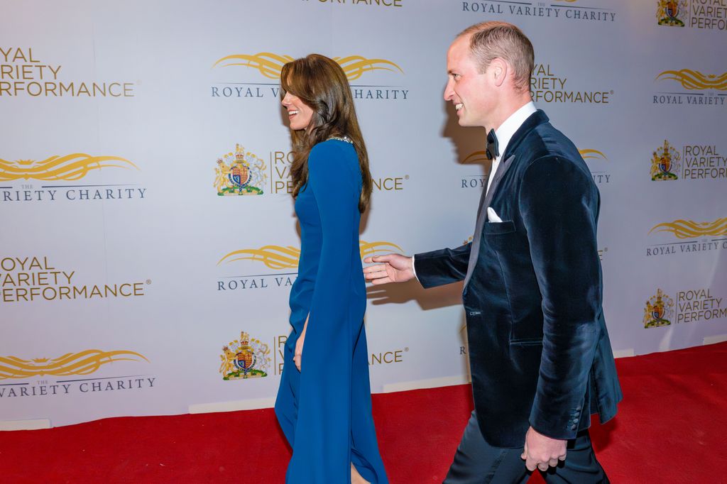 William puts hand on Kate Middleton's back at Royal Variety