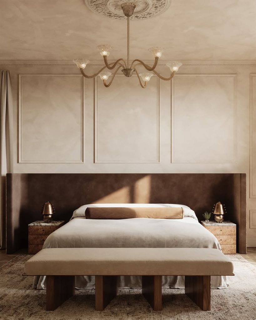 bedroom with panelling and grand light