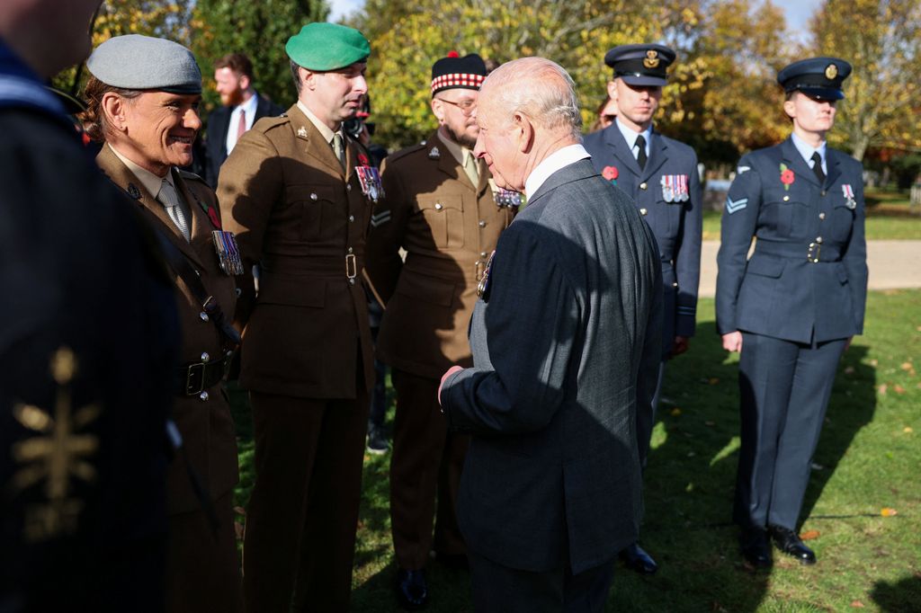 King Charles greets members of the military 