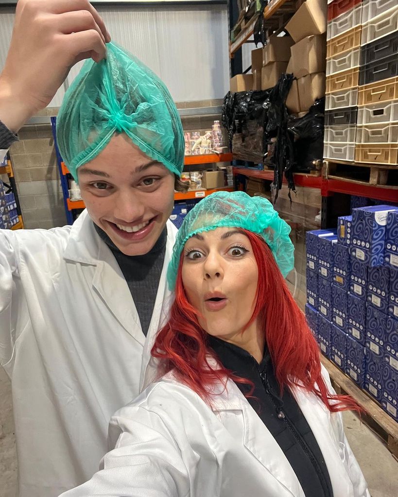 Dianne Buswell and Bobby Brazier wearing protective hats and lab coats in Blackpool