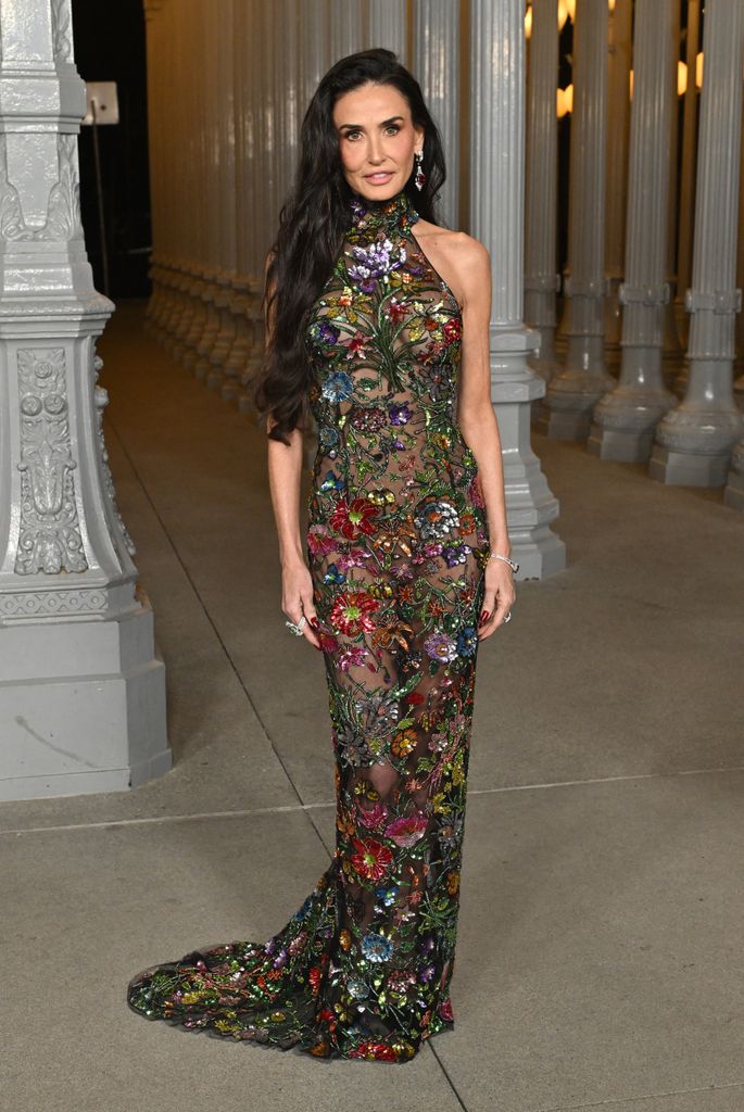 Demi Moore in a custom sheer Gucci gown by Demna