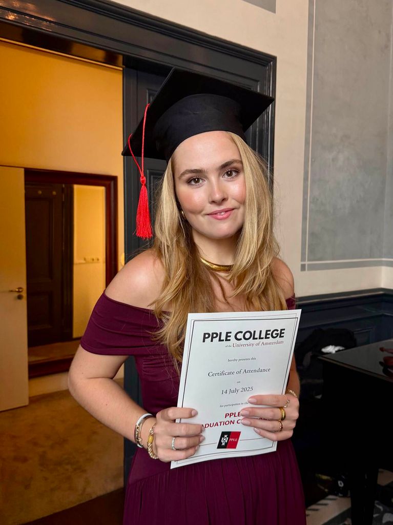 Princess Catharina-Amalia in off-the-shoulder dress and graduation cap