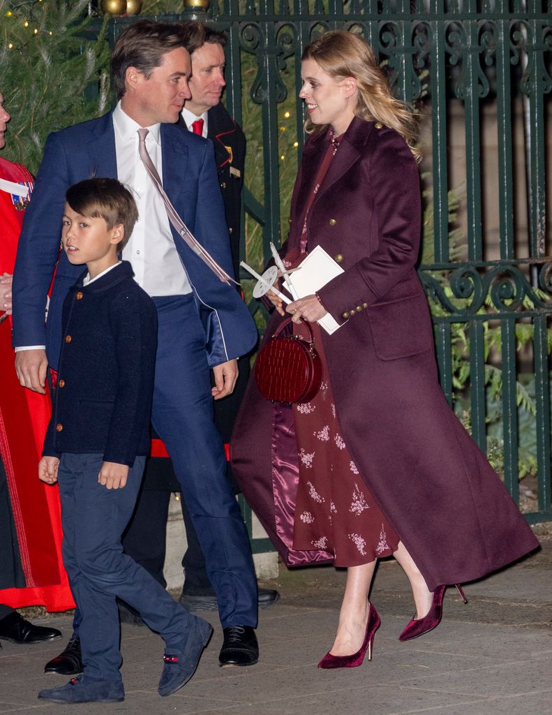 Wolfie matched with his father's navy suit