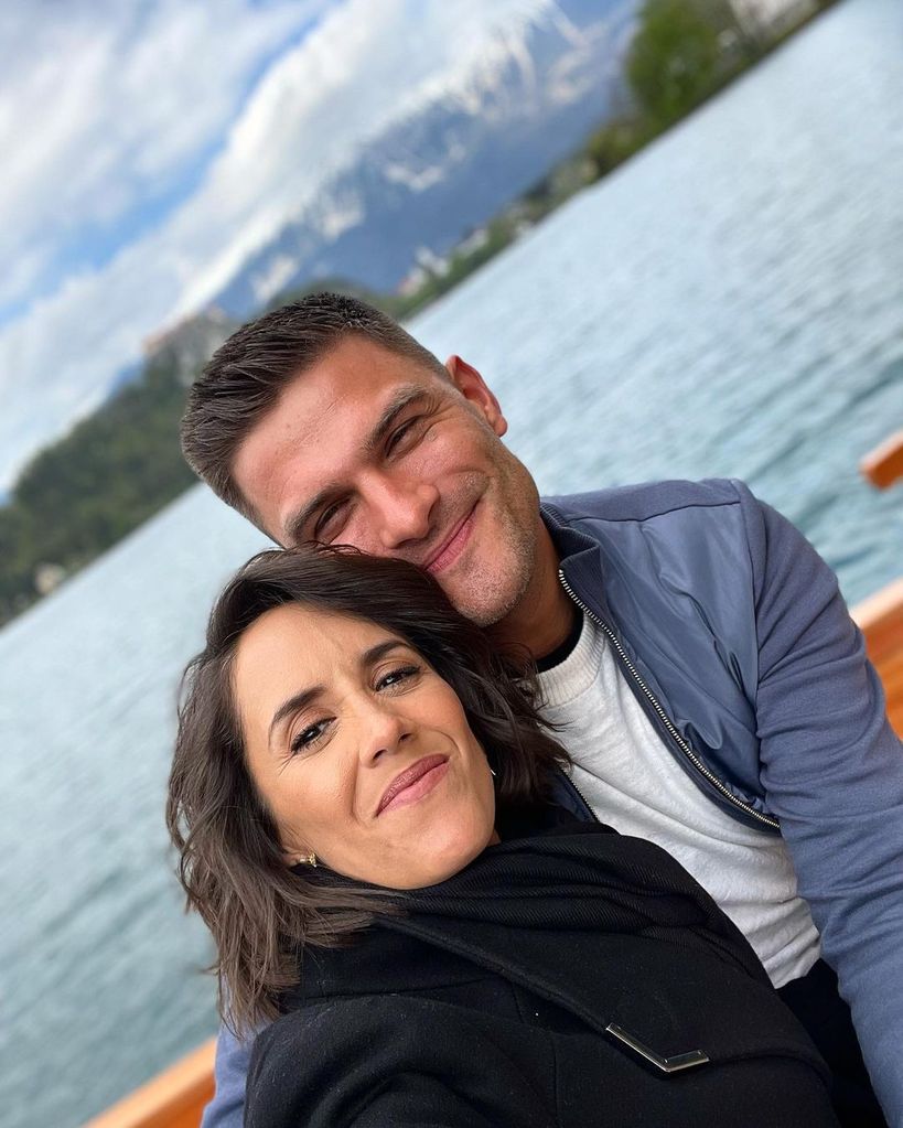 janette manrara and aljaz skorjanek posing for selfie on boat