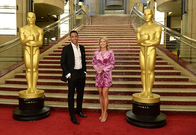 T.J Holmes and GMA co anchor Amy Robach posing at the Oscars