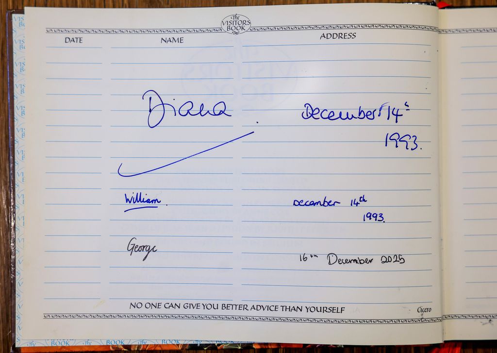 A guestbook carrying Princess Diana, Prince William and Prince George's signatures