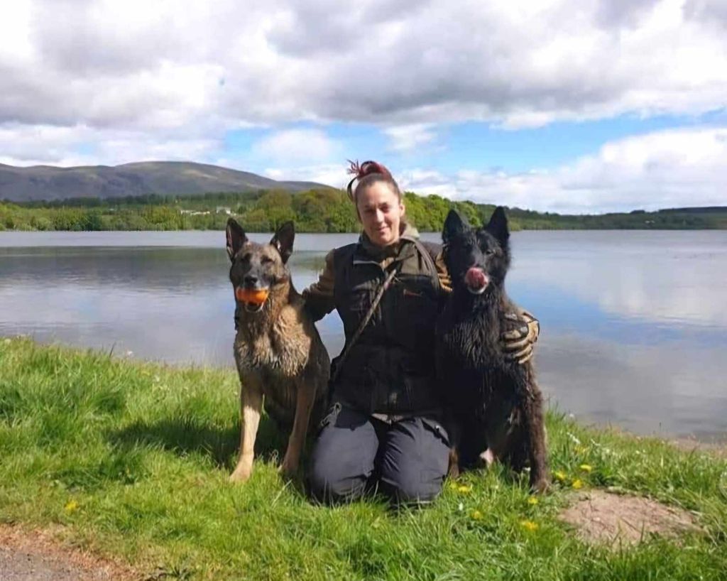 Jaime with retired dogs Fazz and Marion