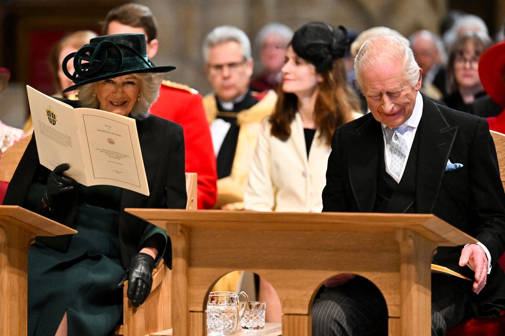 Charles and Camilla seated in church