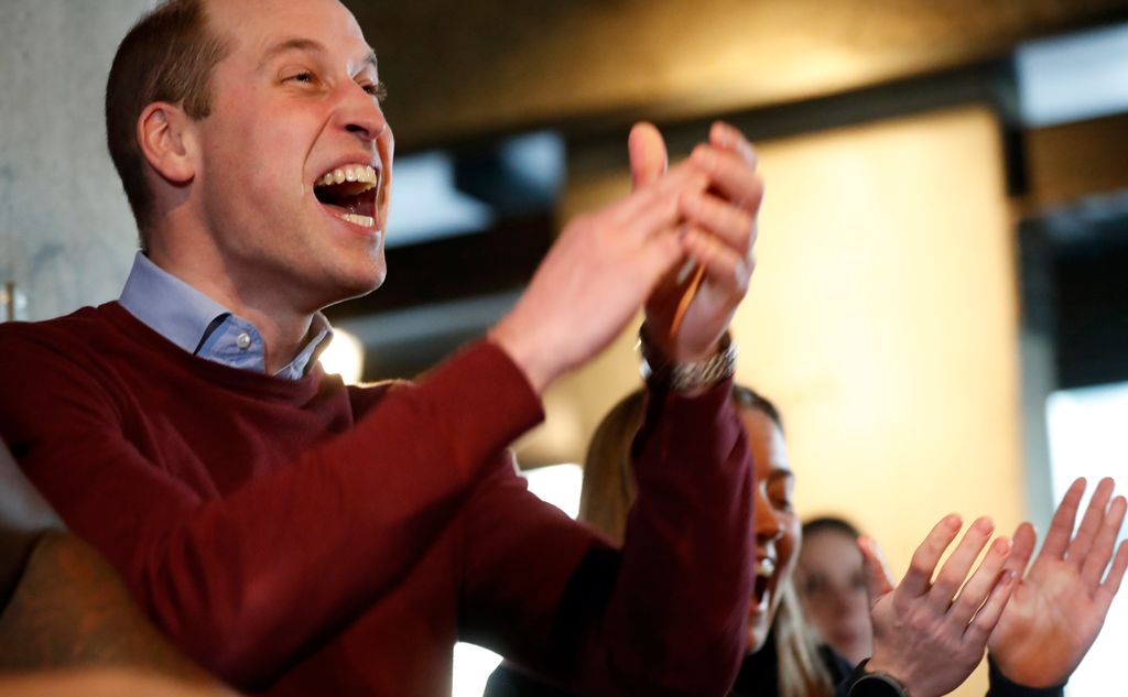 Prince William cheering on Aston Villa, shouting and clapping