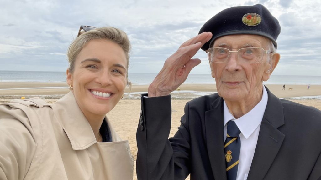 Vicky McClure and her Grandad Ralph take a selfie at Sword Beach in France in 2023