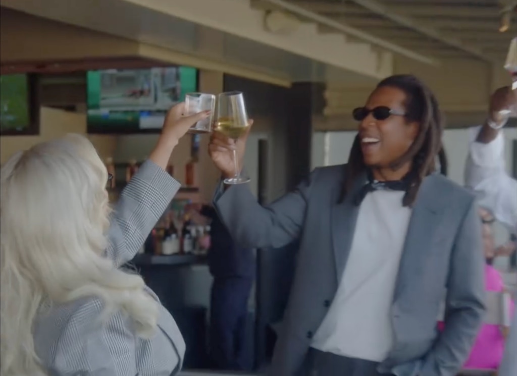 Beyoncé and Jay-Z clink their drinks at the Inaugural California Crown in partnership with the h.wood Group at Santa Anita Park, shared on Instagram