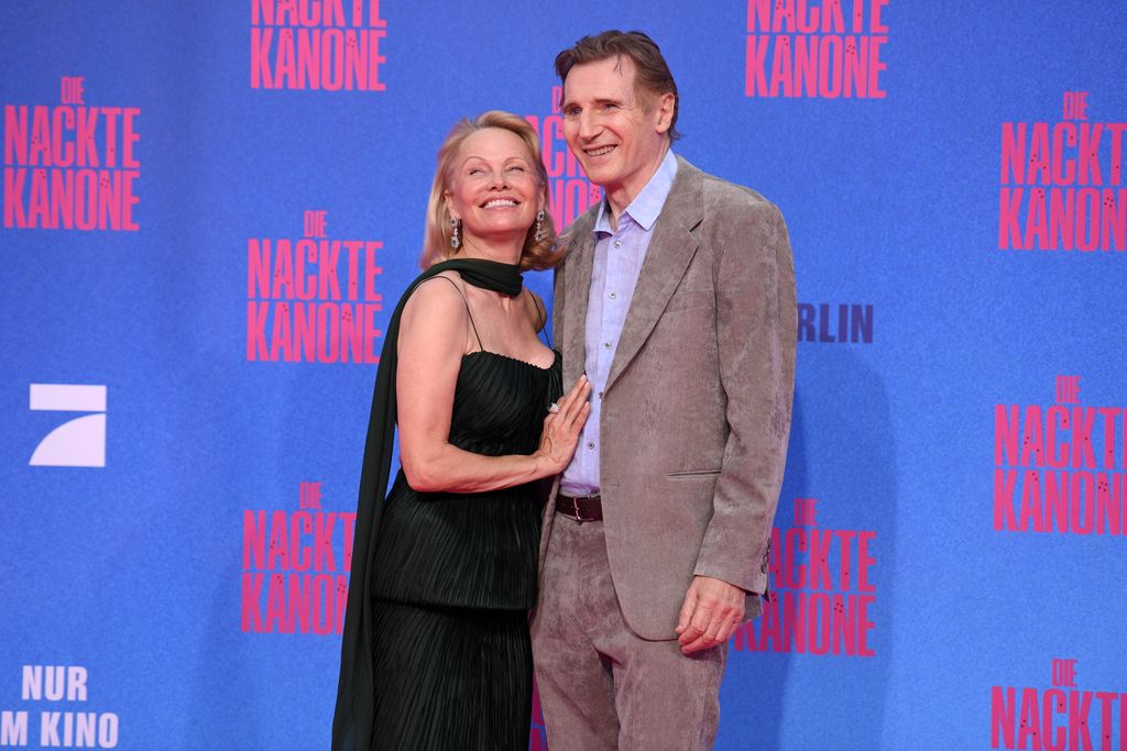 US actress Pamela Anderson and british-irish actor Liam Neeson attend the Berlin premiere of the movie "The Naked Gun" at UCI Luxe East Side Gallery on July 24, 2025 in Berlin, Germany.