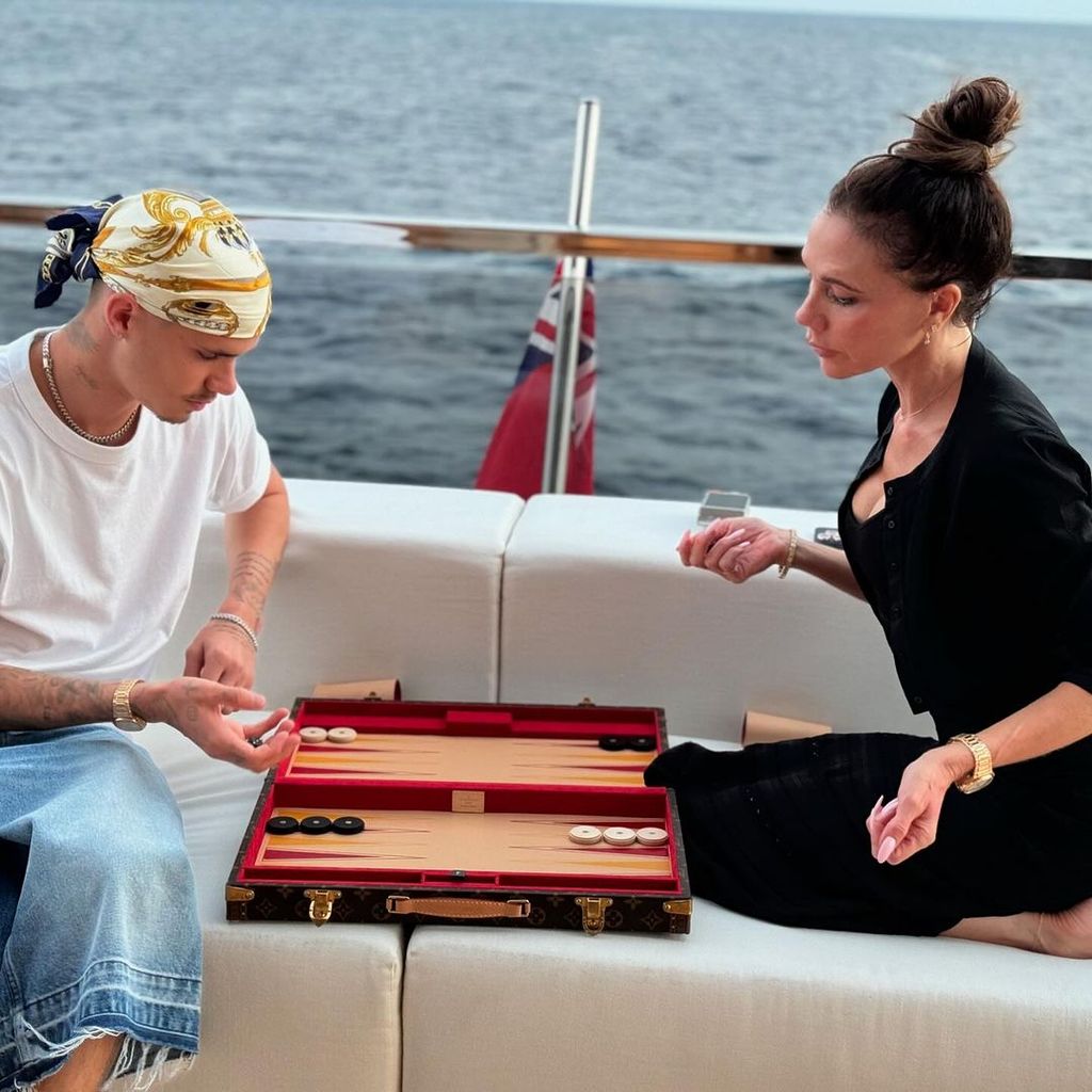 Romeo and Victoria were pictured with Louis Vuitton's sell-out 'Boîte Jeu Backgammon' board