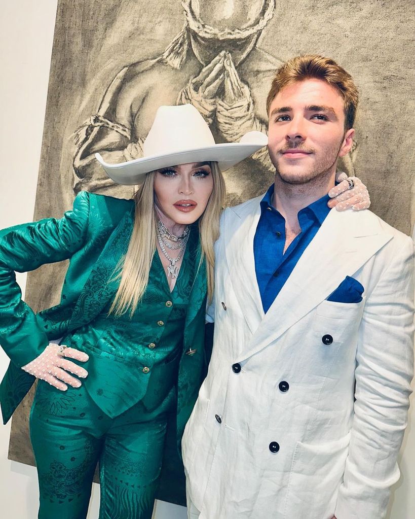 Madonna with her son Rocco Ritchie at his art show "Pack a Punch"