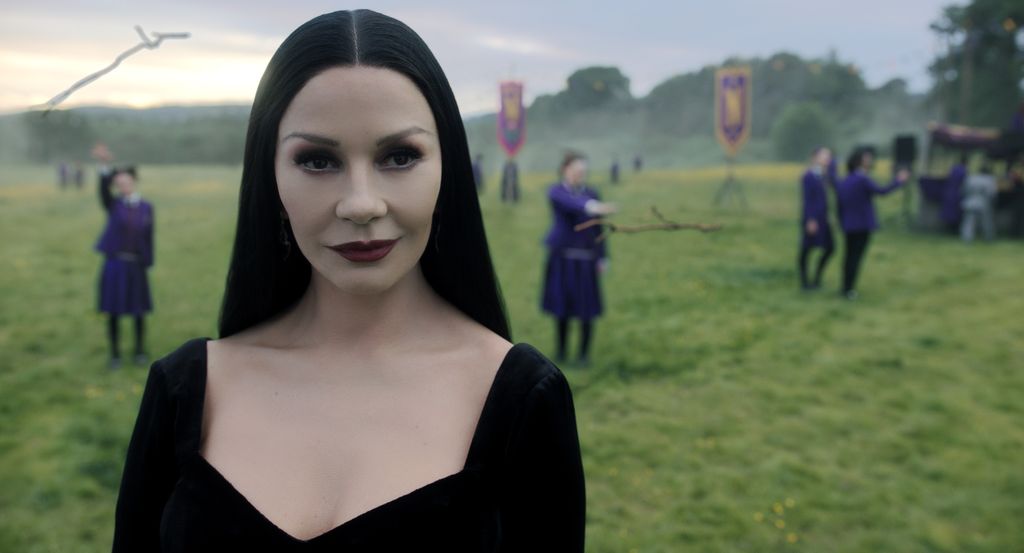 close-up woman with long dark hair in field