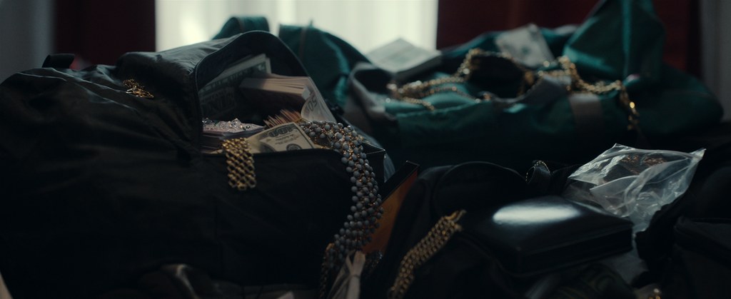 Bags full of stolen goods including cash and jewellery