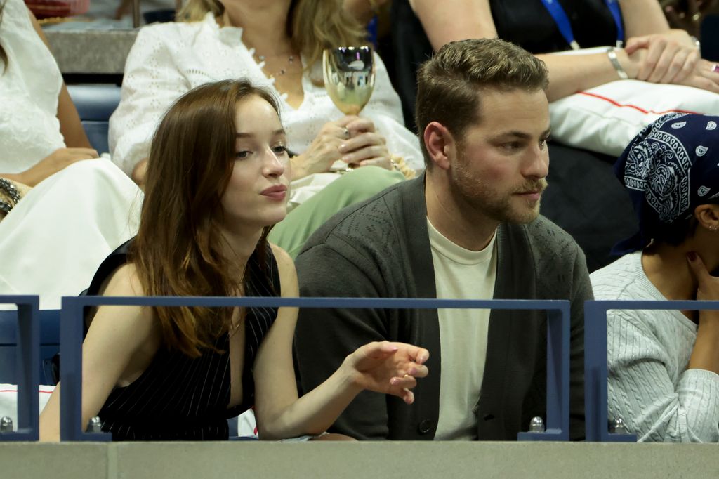 Phoebe Dynevor and Cameron Fuller watch US Open game