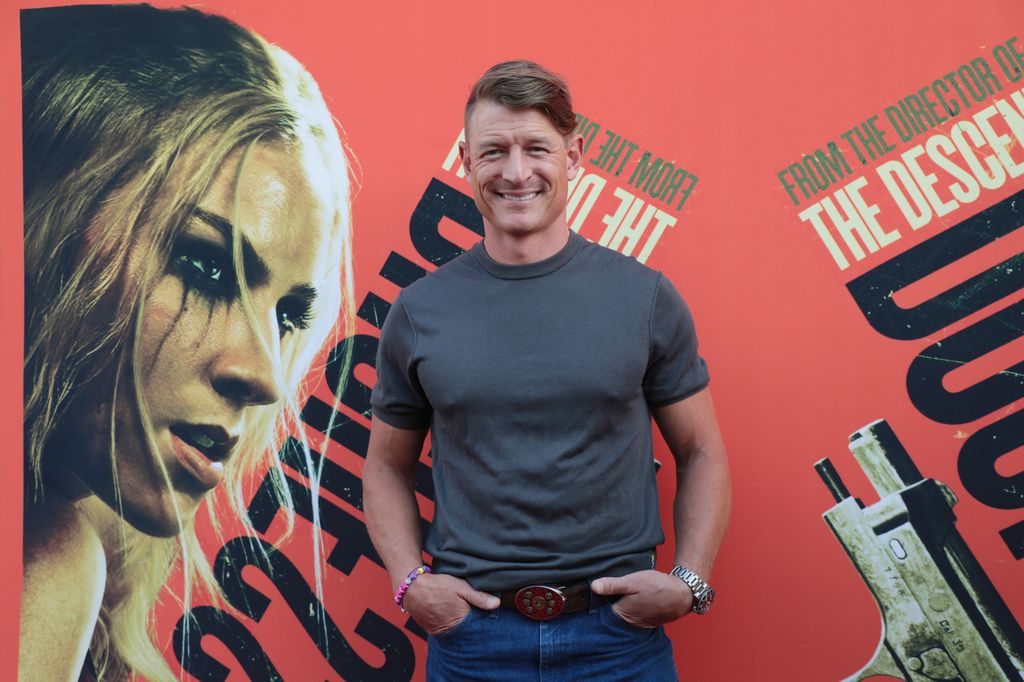 Philip Winchester poses on the red carpet for Saban Films, Duchess premiere at Lumiere Cinema at the Music Hall on August 06, 2024 in Beverly Hills, California