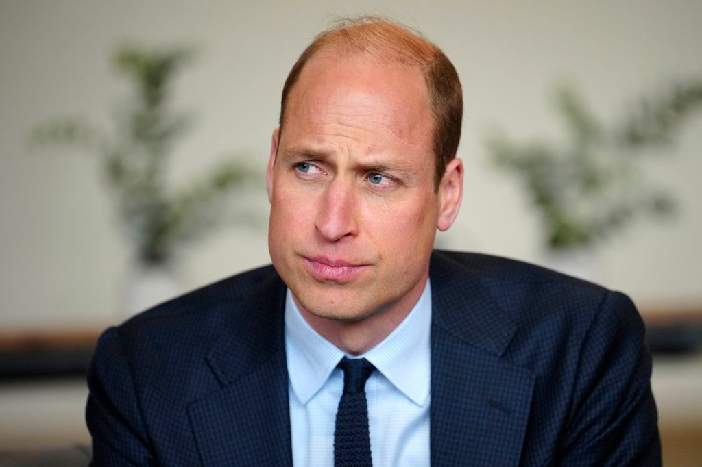 Prince William in a blue suit and tie