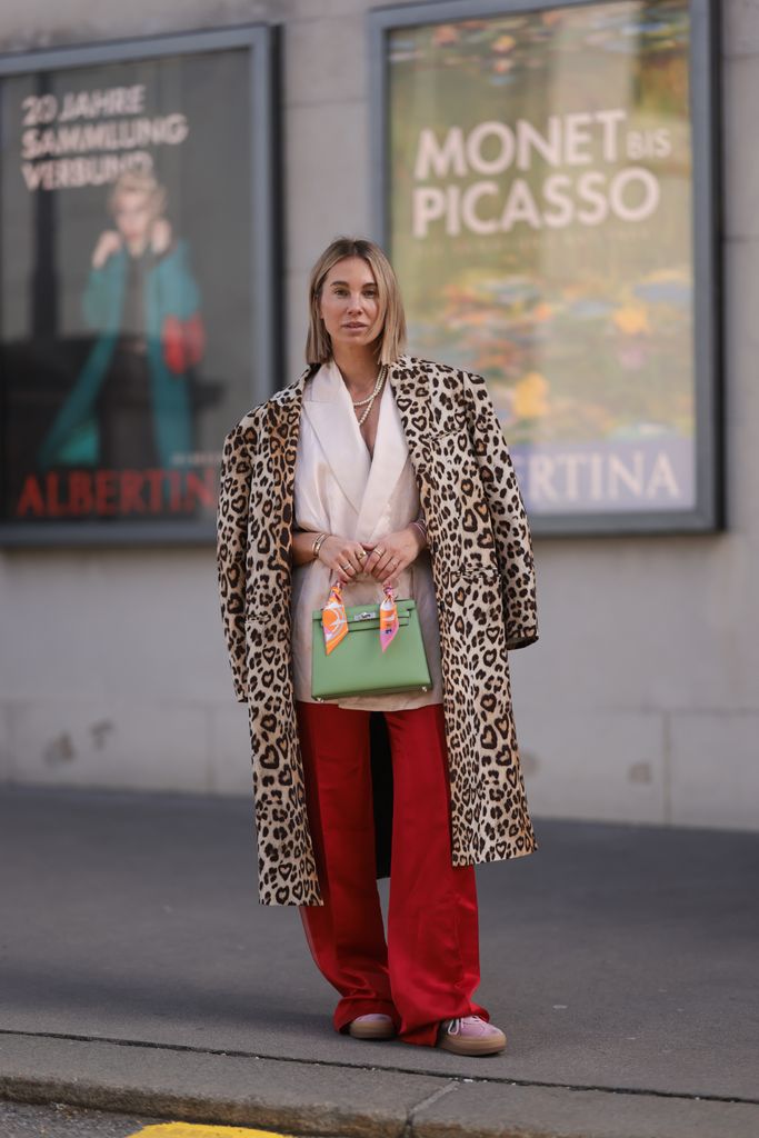 We love how Karin Teigl has styled the leopard coat with bold colours