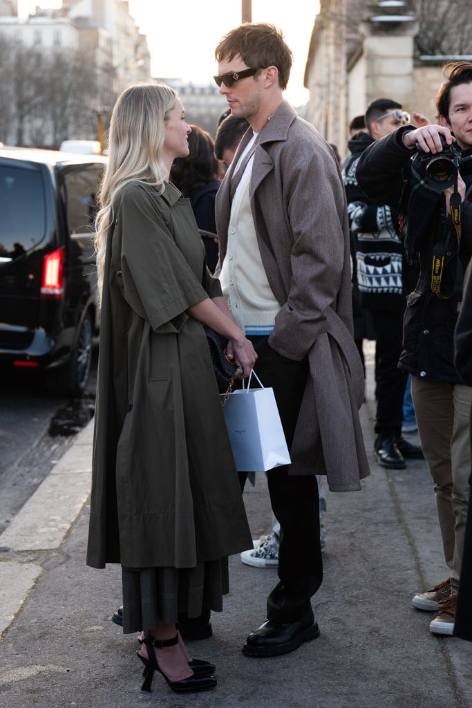 Bryana Holly and Nicholas Hoult gazing at each other in Paris 