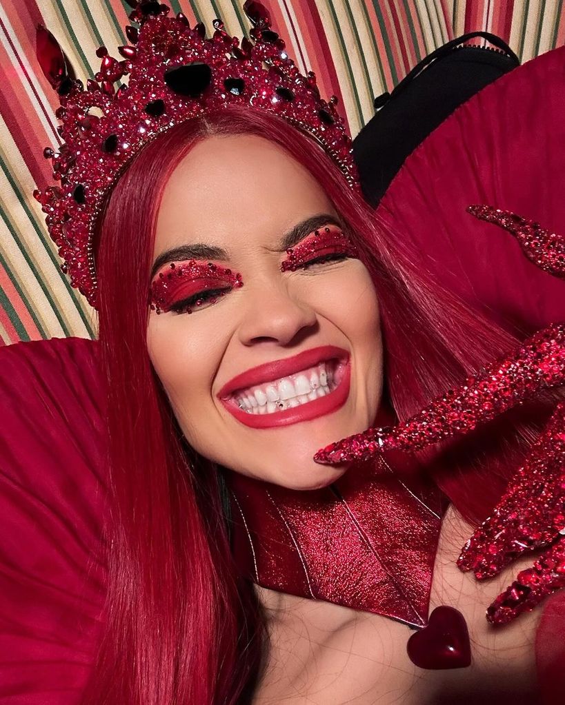 Rita Ora wearing red make-up and a diamante crown