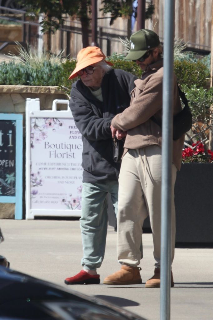 Legendary Oscar-winning actress Shirley MacLaine was looking very frail as she could barley stand and was being assisted by her caregiver during lunch in Malibu. She only was able to drink water and did not seem to eat any food