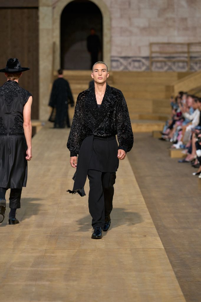 Nikko Gonzalez walks the D&G runway show in Italy