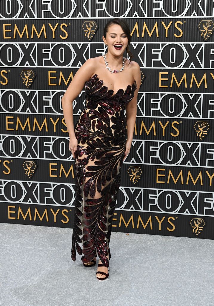 Selena Gomez having a fabulous time at the Emmys